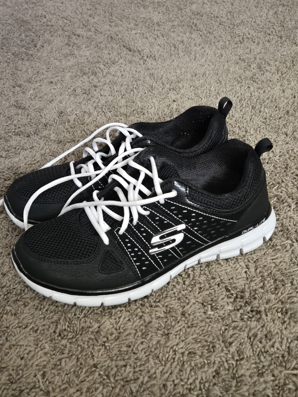 Skechers Men’s Black Athletic Sneakers with White Soles